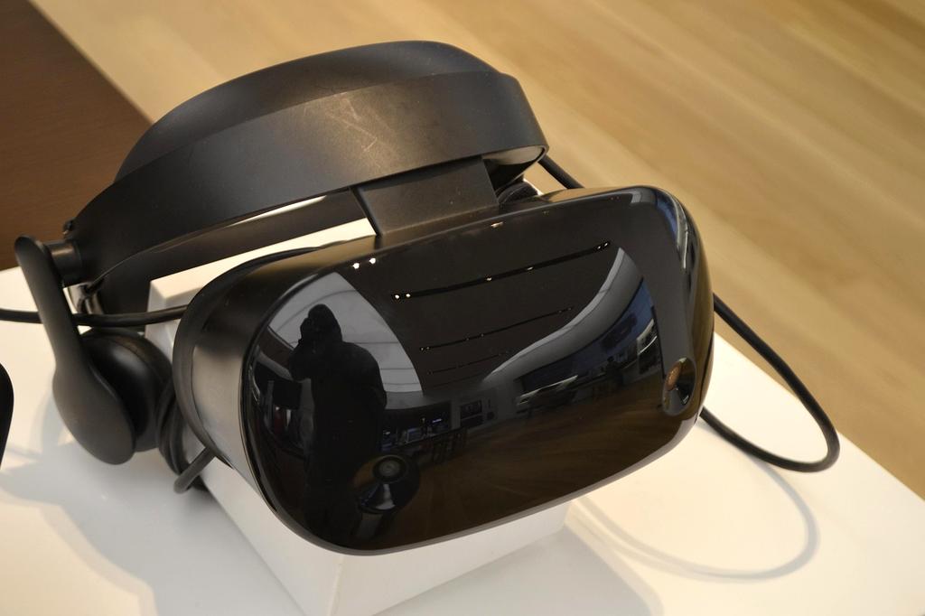 Person wearing VR headset exploring digital interface