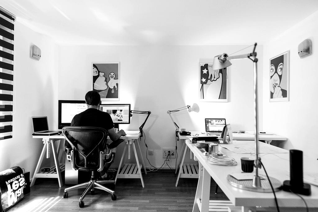 Team of VR developers collaborating in a modern studio